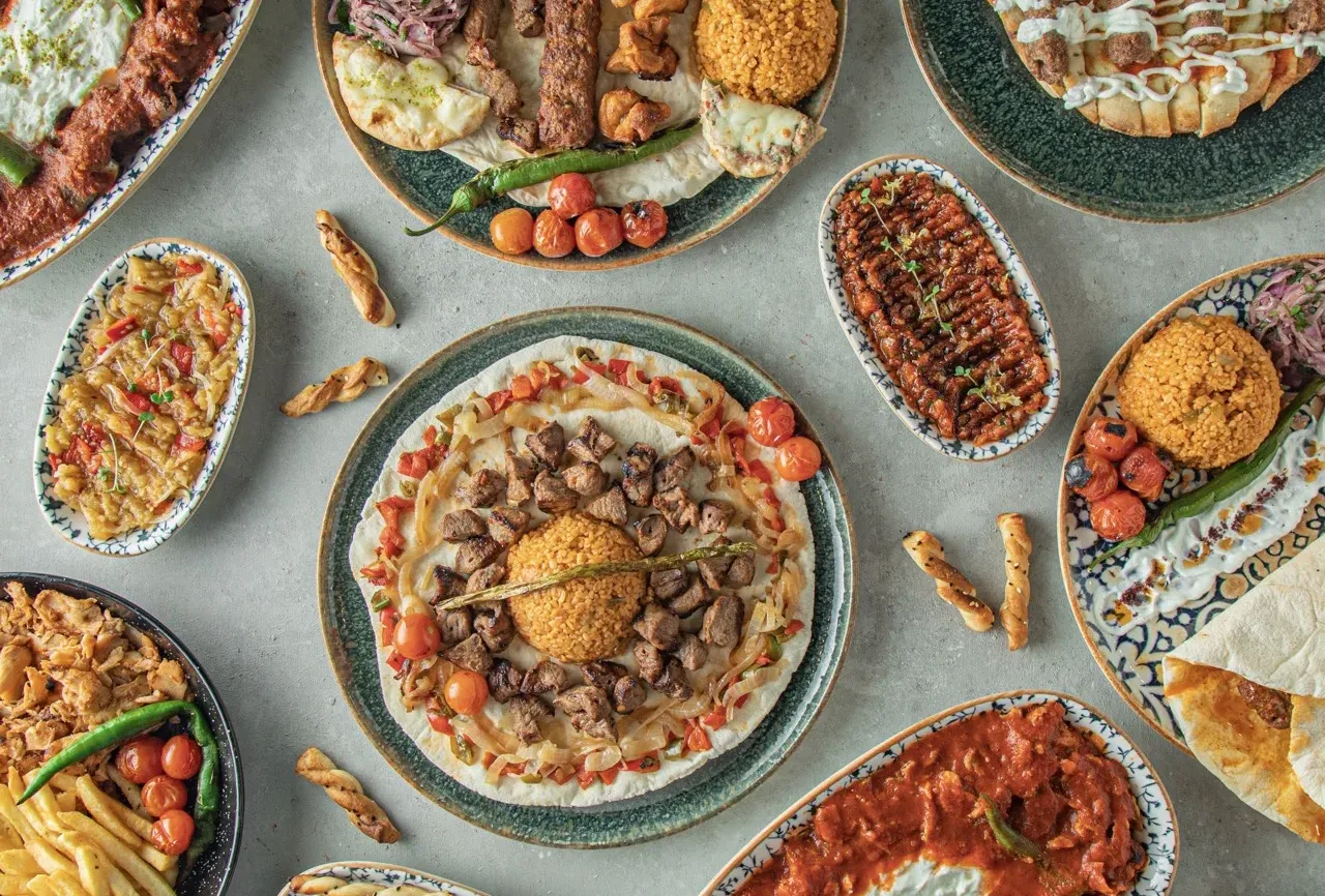 A table of Turkish kebabs, pide and mezze